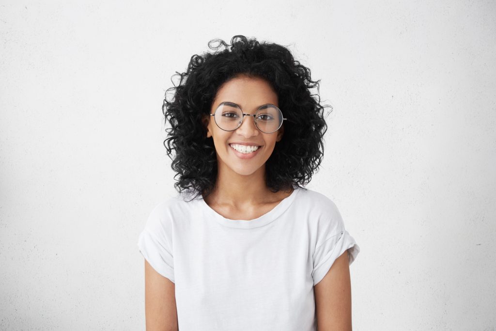 Woman in glasses with frizzy hair