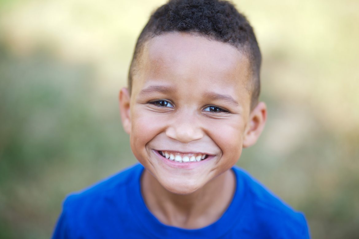 young boy smiling