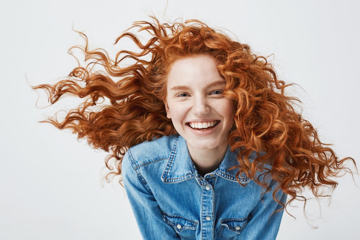 woman with wild curly red hair